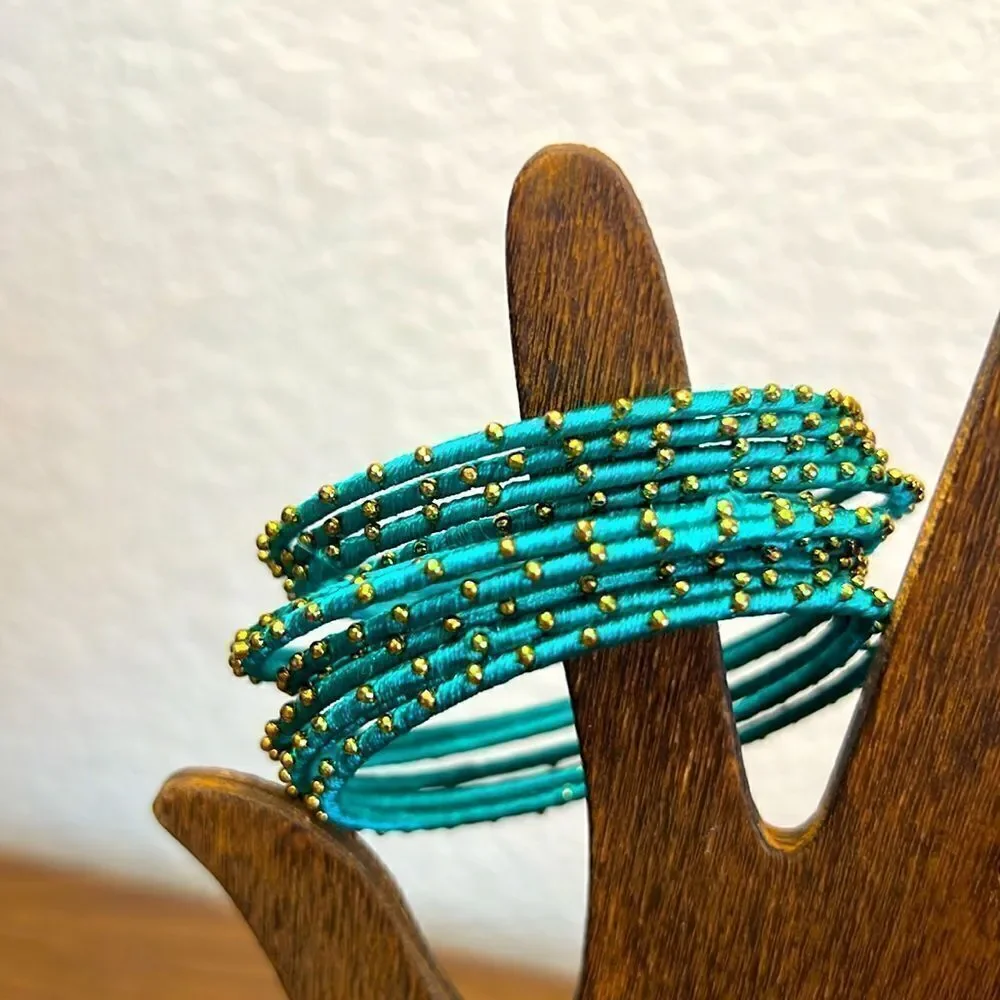 Large Lot of Brass/Thread Bracelets